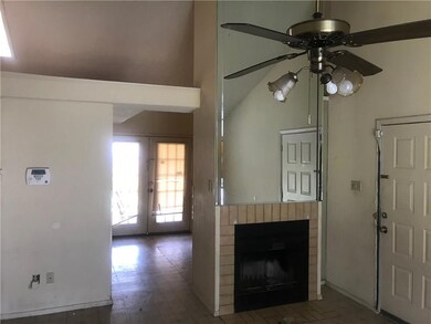Wood burning fireplace in living area