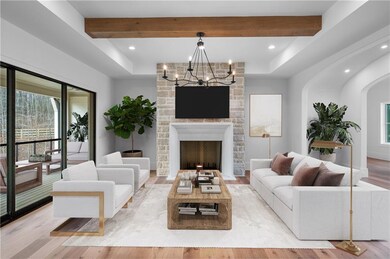 Fireside Great Room overlooks backyard and pool