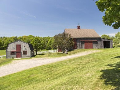 Stables on left, barn on right