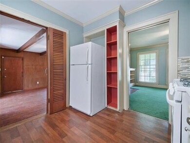 Kitchen View 3:  Refrigerator to remain.  Doors le