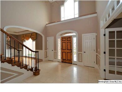 Foyer welcomes guests to this grande home.   Gentl