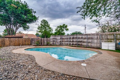Pool with aggregate patio