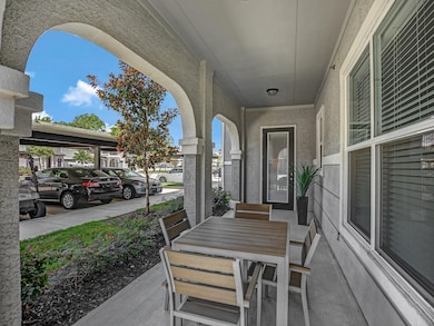 Covered front porch offering a cozy outdoor space.