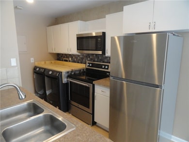 Custom counter over the washer provides extra coun