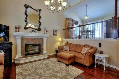 Front Room Features NEW Hardwood Floors & Woodburn