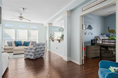 Foyer into office and living room