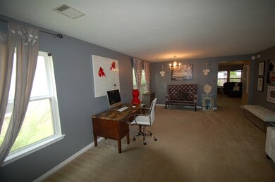 Formal living and dining in front