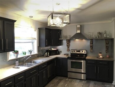 New cabinets, concrete countertops, SS appliances,