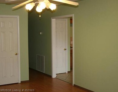 Living Room. Living room leads to kitchen and bedr