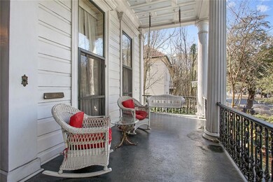 Massive front porch facing St. Charles Ave. Perfec