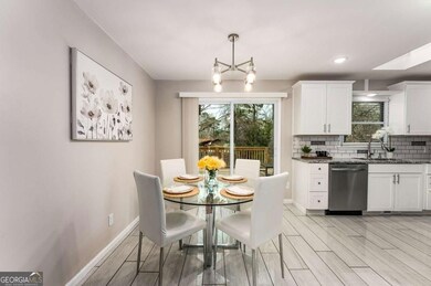 Well lit dining area off kitchen