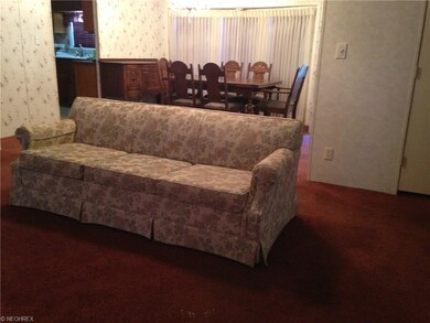 The  dining room, open to the living room.