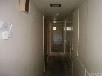 Hallway to bedroom and bathroom