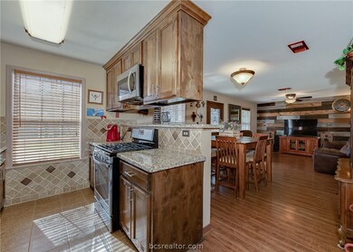 Beautiful updated kitchen looking into the dining