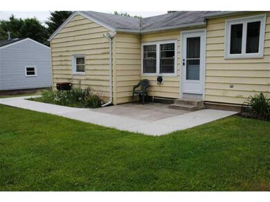 Exterior Back Concrete Patio! Door Into Breezeway!