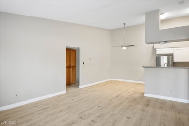 Unfurnished living room featuring light wood-type