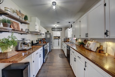 This kitchen features a sleek, galley-style layout