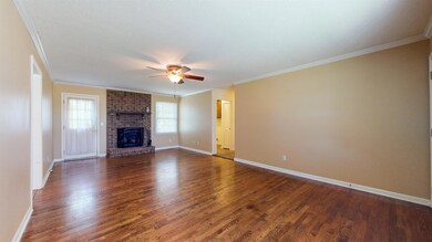 Nice size living room with wood burning fireplace
