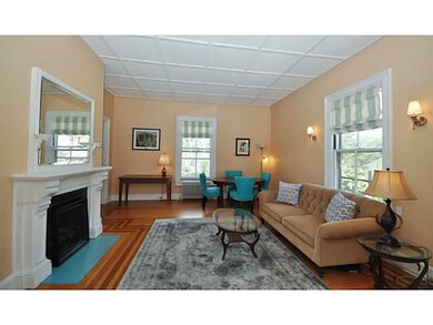 Living Room. High ceilings and large windows offer