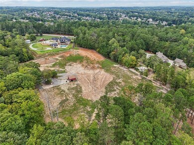 Bird's eye view with a wooded view