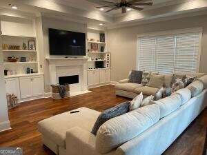 with gas log fireplace with built in bookcases