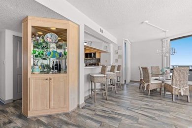 Dining space featuring an inviting chandelier and 