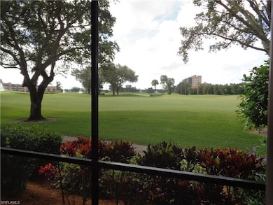 View of property's community with a yard