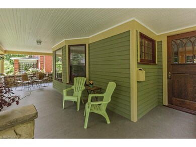 Impressive Front Porch w/Stone Railing