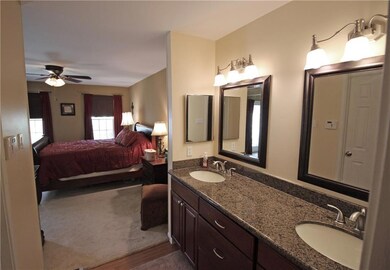Updated master bath with new cabinets, light fixtu