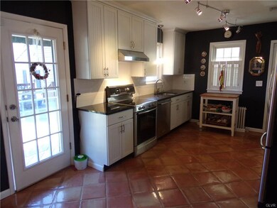 Updated kitchen with door to Deck 21'x22'
