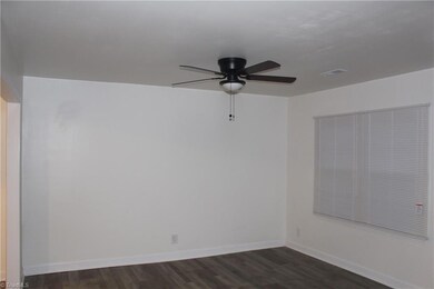 Living room - new paint, ceiling fan and flooring