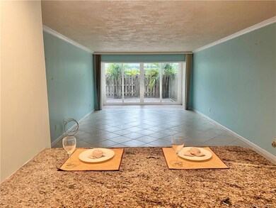 View into great room and impact glass sliders lead