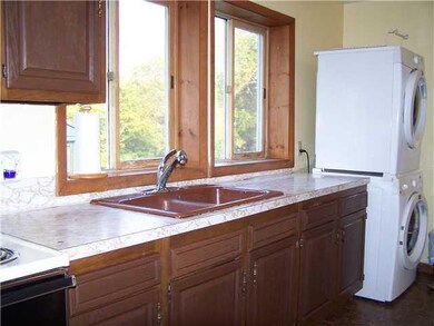 Kitchen Large kitchen with new washer and dryer