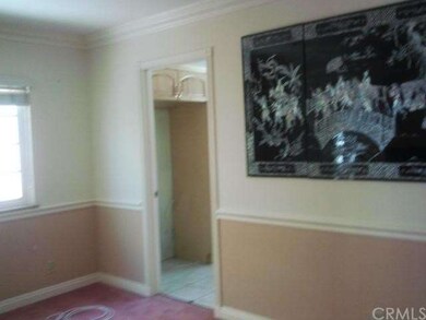 STEP UP FROM LIVING ROOM TO FORMAL DINNING ROOM