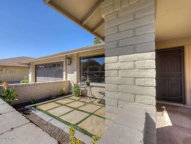 002_Front Courtyard and 2 Car Garage