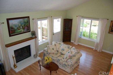 View of Entry and Living Room from Stairs! Light, 