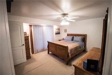 Cool feature about this master bedroom is the slid