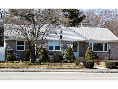 Exterior Front. Mature landscaping with fenced in