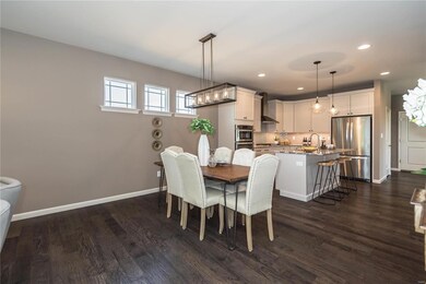 Photo representation of a similar home.  Some feat