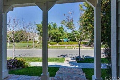 This expansive front porch looks out on an well-ap