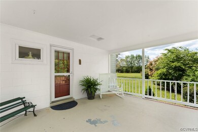 Closer view of side porch. Test out the rocking ch