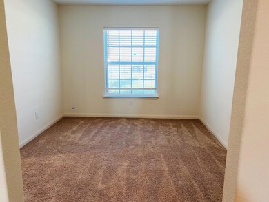 Empty room featuring carpet floors