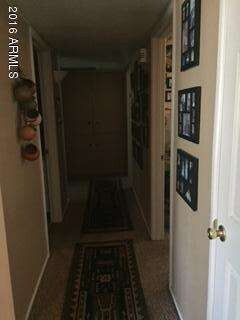 Hallway to other 3 Br