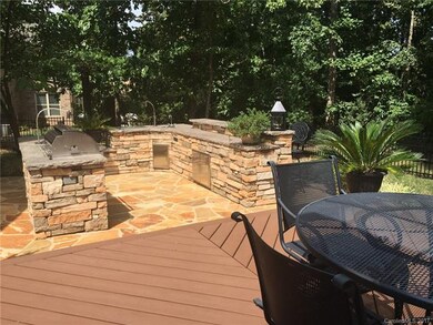 View of stone built-in kitchen.