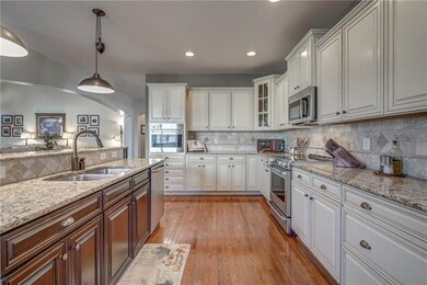 Gourmet kitchen!  Extensive custom 42
