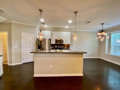Kitchen with appliances with stainless steel fini
