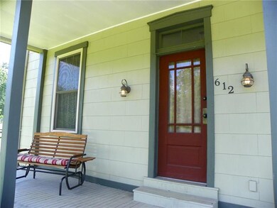 The covered front porch is very inviting and a gre
