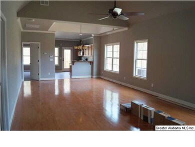 Great Room with vaulted ceiling, looking to Dining