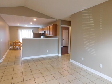 LIVING ROOM LOOKING INTO KITCHEN