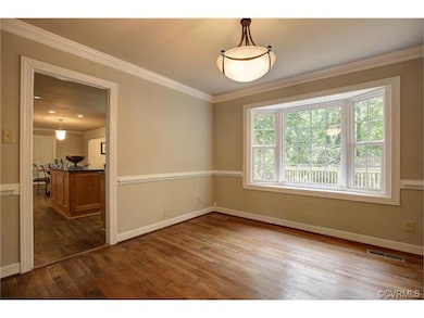 The large Dining Room offers chair and crown mould